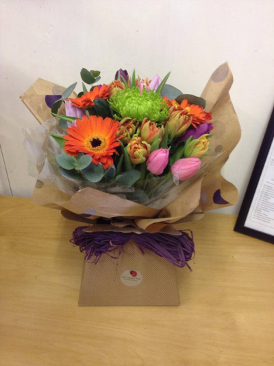 Bright Eyes - Flowers presented in an aqua box in vibrant/bright colours in orange, pink and greens.